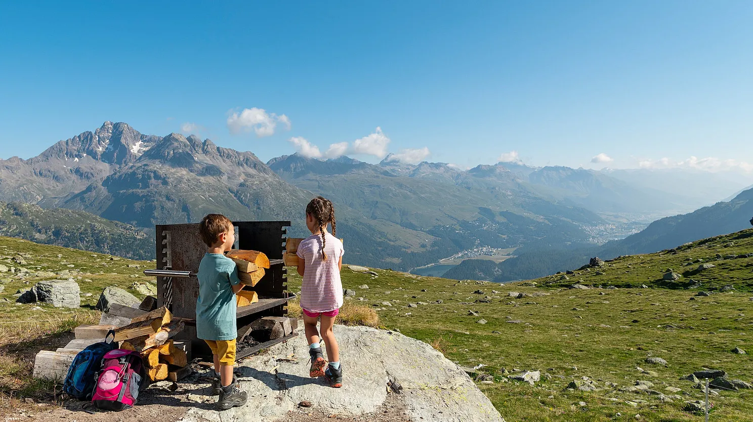 Children at a station of the water trail overlooking the Upper Engadine